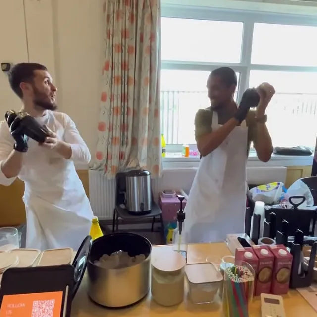 Two shakers going at once behind the table